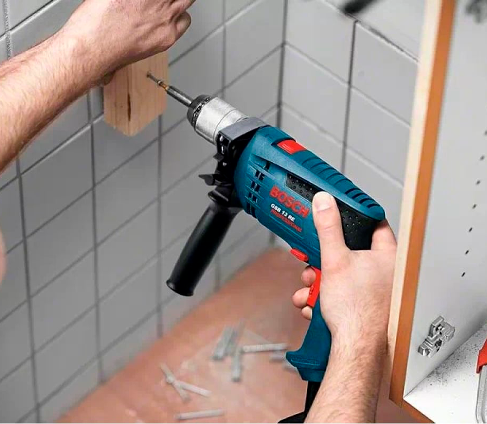 Mașină de găurit cu percutie BOSCH GSB 13 RE 600w photo 4